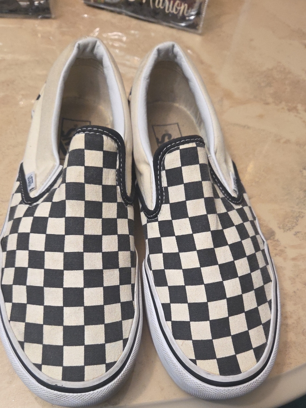Vans Black & White Checkerboard Slip-On Sneakers